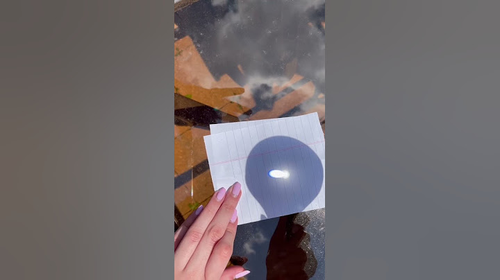 Making fire with a magnifying glass - physics  experiment