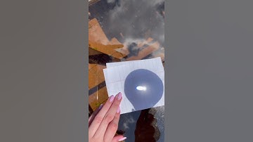 Making fire with a magnifying glass - physics  experiment