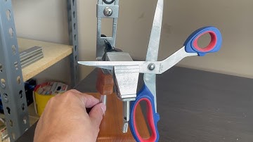 Scissors attachment for KME knife sharpening system.