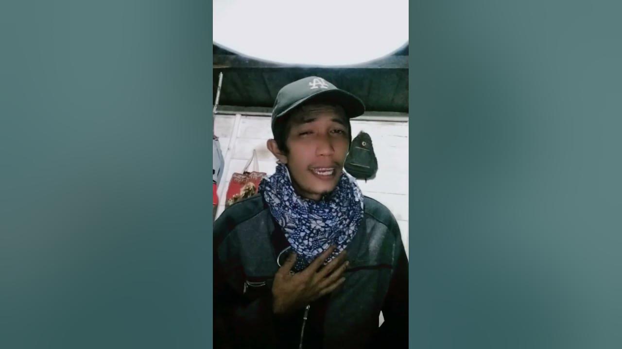 parodi lagu es Te 12