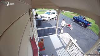 Boy crashes dirt bike into parked car in driveway
