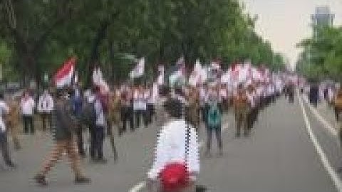 Pro-Palestinian protesters march to U.S. Embassy
