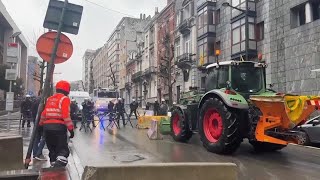 Scuffles between Belgian farmers and police in front of European Council building