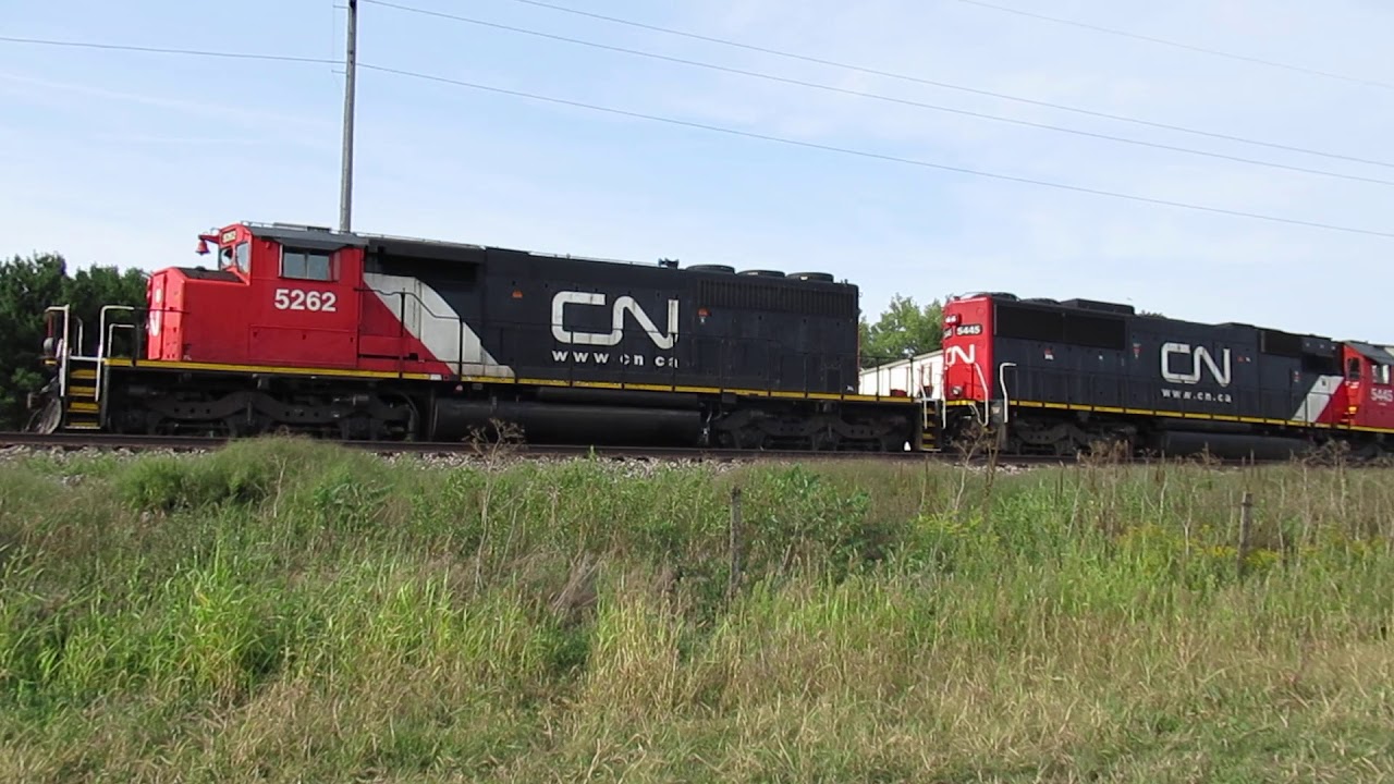 CN 5262, 5445 are on the spur track at Harborlite while the crew figures out what do with a hopper