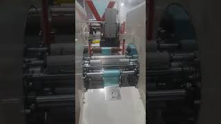 rolling type continuous garbage bag making machine