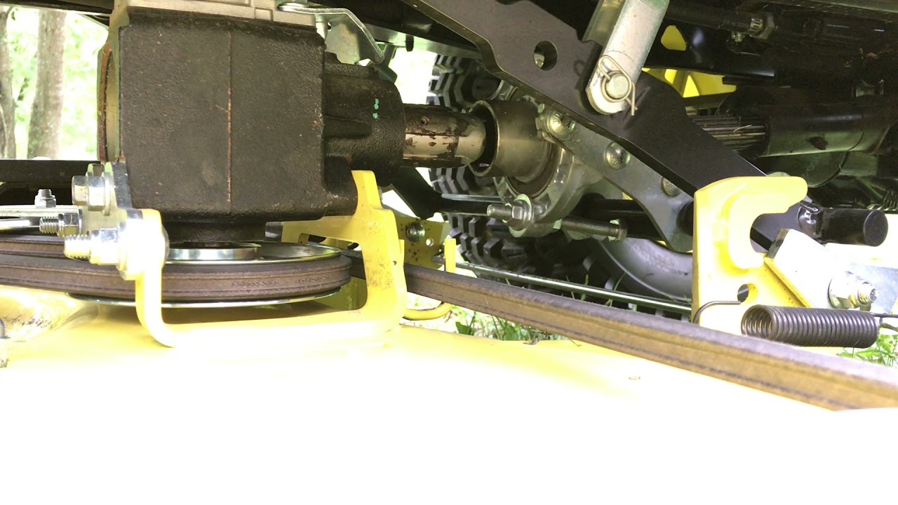 John Deere X758 Quick Hitch in action watch it work on a 62 inch deck