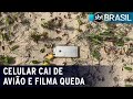 Celular despenca de avio filma queda e dono recupera aparelho intacto  sbt brasil 141220