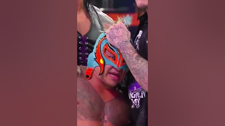 Rey Mysterio saved after being beaten by his own son!