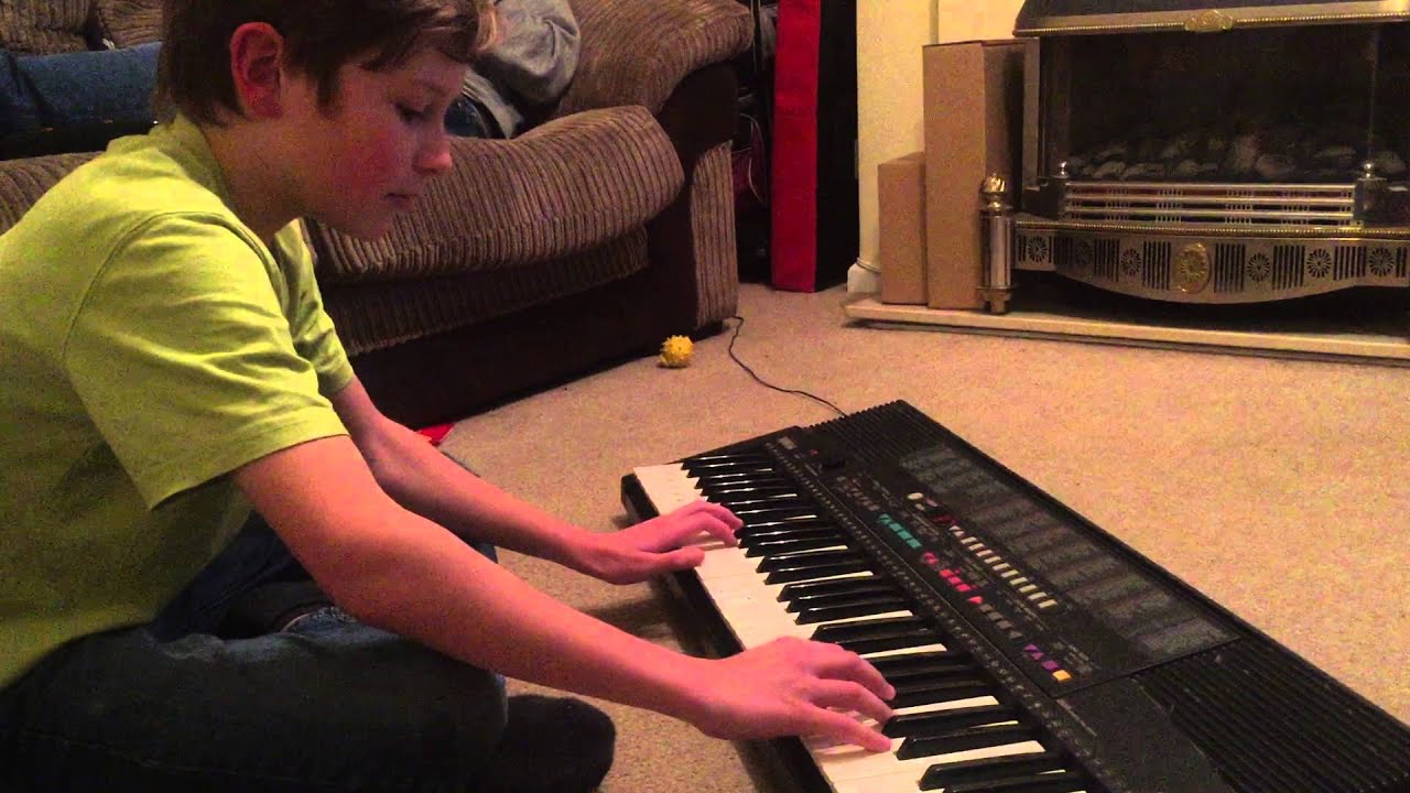 Tommy playing keyboard . He only started playing it 3 days ago - YouTube
