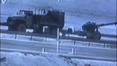 AH-64 Apache attack helicopter taking out Iraqi trucks and artillery with its 30mm cannon