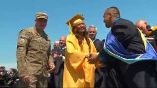 Air Force Airman surprises little sister at graduation