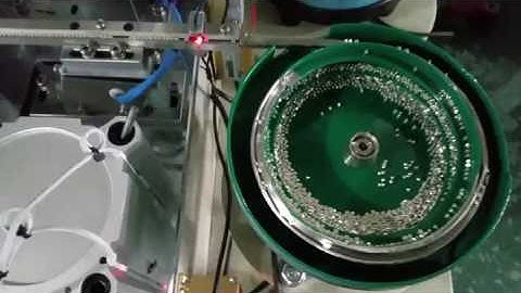 Automatic riveting machine for stamping parts and bimetal rivets