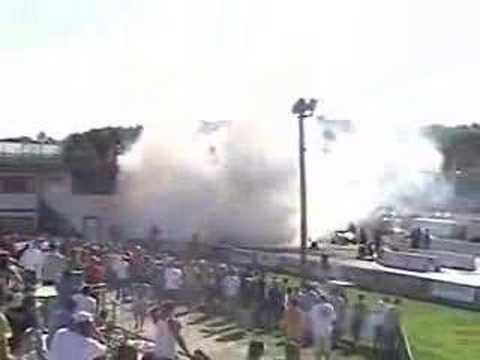 I bet ya never seen something like this before. A crazy drag racing Semi Truck doing a giant burnout while shootin 10 foot flames from the smoke stacks and then doing doughnuts and such. This was done at NOPI in Epping NH 06.