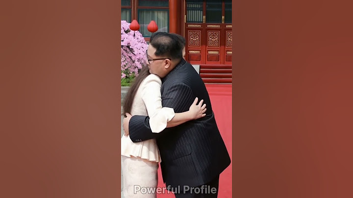 Kim Jong Un Hugs & Walks with Wife Ri Sol Ju