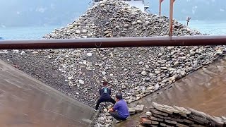 Barge unloads 3500 tons of large cobblestone- relaxing video