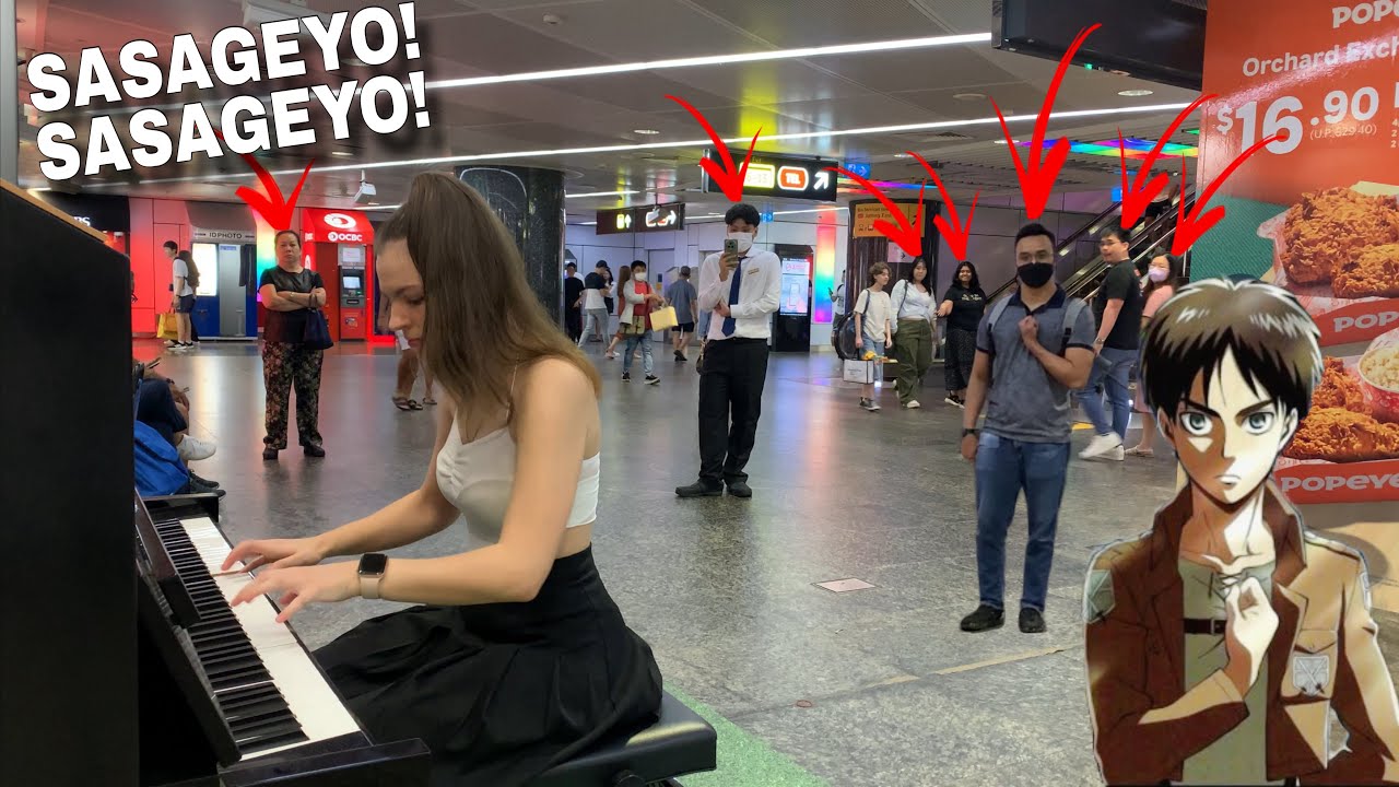 Watch I played SASAGEYO (ATTACK ON TITAN OP) on piano in public! on YouTube