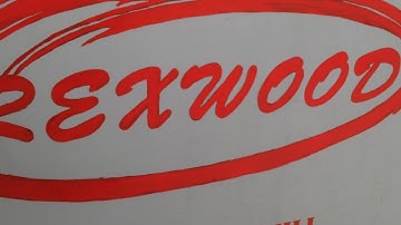 Cutting spruce log in to beams on REXWOOD mobile sawmill