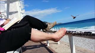 Mature French Woman relax her tired feet @ beach