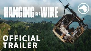 Hanging By A Wire - Official UK Trailer
A school commute takes a terrifying turn when a cable cars wires snap, leaving eight passengers - including six schoolboys - suspended 900 feet above a ravine in the remote Himalayan foothills of northern Pakistan.
Within hours, what begins as a local emergency rapidly becomes an international spectacle as families gather below and an ambitious rescue unfolds live on television and social media. With no margin for error and a single cable that could fail at any moment, an unlikely alliance of civilian rescuers, police, and military forces must improvise under intense public scrutiny, in a race against the clock before disaster strikes.
In cinemas from 28 August.
https://releasing.dogwoof.com/hanging-by-a-wire
Subscribe to our newsletter: https://releasing.dogwoof.com/newsletter Hanging By A Wire - Official UK Trailer
