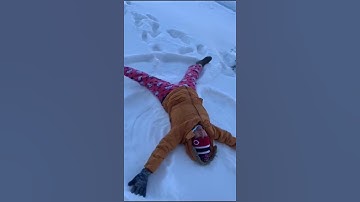 Thumbnail of Making snow angel | bored? Run outside and make a snow angle | #snowangle #snowydays