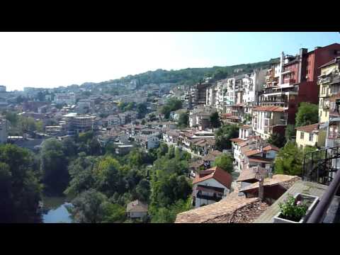 A capture of part of the city of Veliko Tarnovo, Bulgaria. Veliko Tarnovo is a city in north central Bulgaria and the administrative centre of Veliko Tarnovo Province. Often referred to as the "City of the Tsars", Veliko Tarnovo is located on the Yantra River and is famous as the historical capital of the Second Bulgarian Empire, attracting many tourists with its unique architecture. The old city is situated on three hills, Tsarevets, Trapezitsa and Sveta Gora raising amidst the meanders of the Yantra. Tsarevets housed the palaces of the Bulgarian Emperors and the Patriarchate, as well as a number of administrative and residential edifices surrounded by thick walls. Trapezitsa was known for its many churches and as the main residence of the nobility. In the Middle Ages it was among the main European centres of culture and gave its name to the Tarnovo Artistic School of architecture, painting and literature. Veliko Tarnovo is an important administrative, economic, educational and cultural centre of Northern Bulgaria.