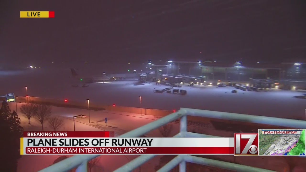 Delta jet slides off runway during snow at RDU, officials say - CBS 17