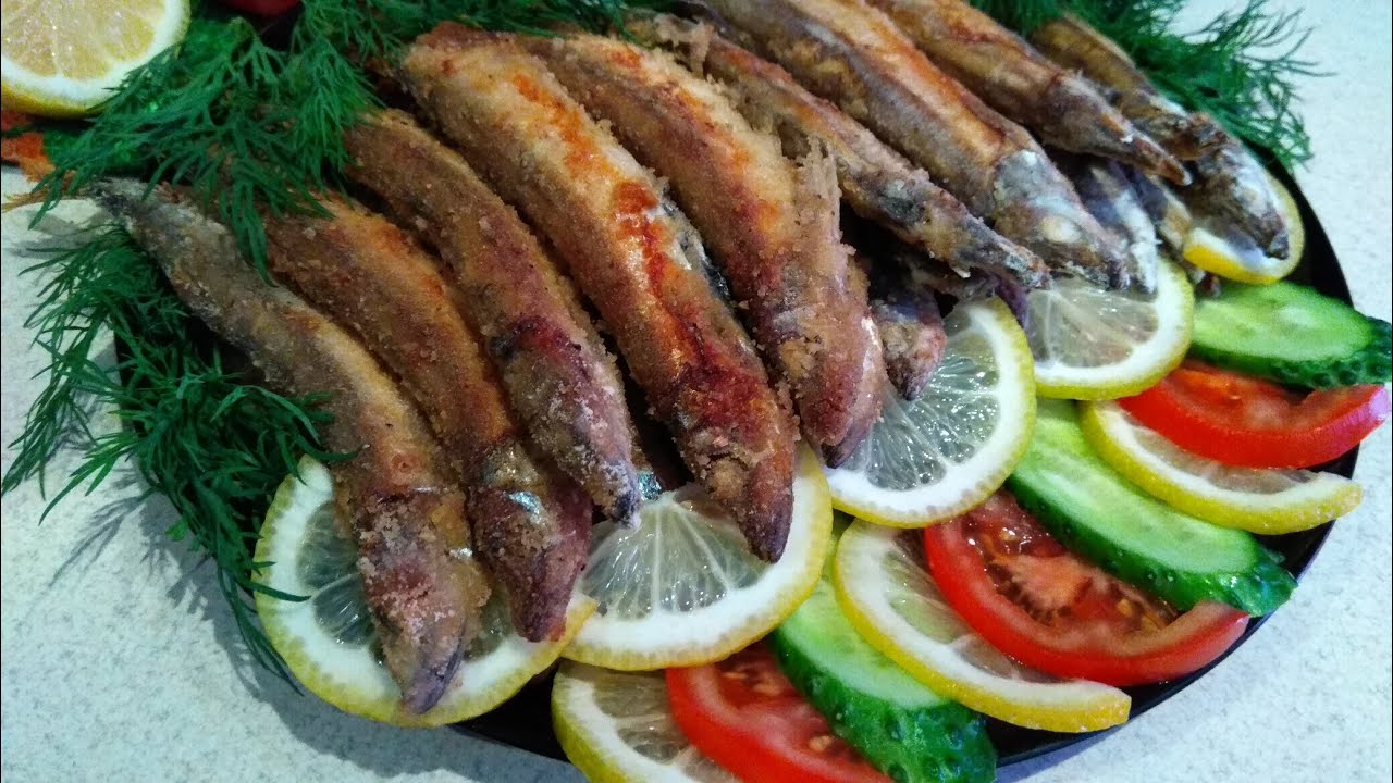 мойва в панировочных сухарях в духовке. мойва в панировочных сухарях в духовке. мойва в панировочных сухарях в духовке. мойва жареная в духовке. путассу.