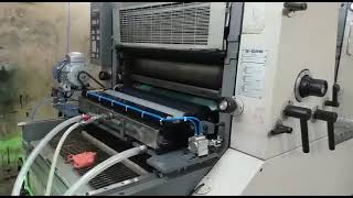 UV, Drip Off and Aqueous Coating on Komori Sprint 228 Offset Printing Machine.