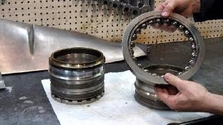 the Thrust Bearing: what holds it in?