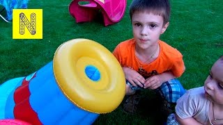 Детская пневматическая пушка. Распаковка игрушки и стрельба. Children's pneumatic cannon