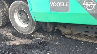 Asphalt paver VOGELE SUPER 18002, laying asphalt concrete mixture. How to lay a new road review