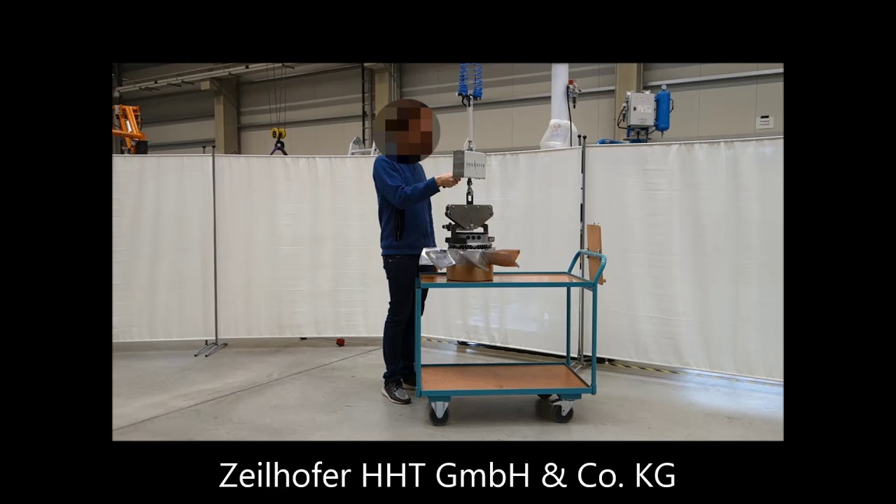 Zeilhofer handling: kundenseitiger Greifer / customer gripper
