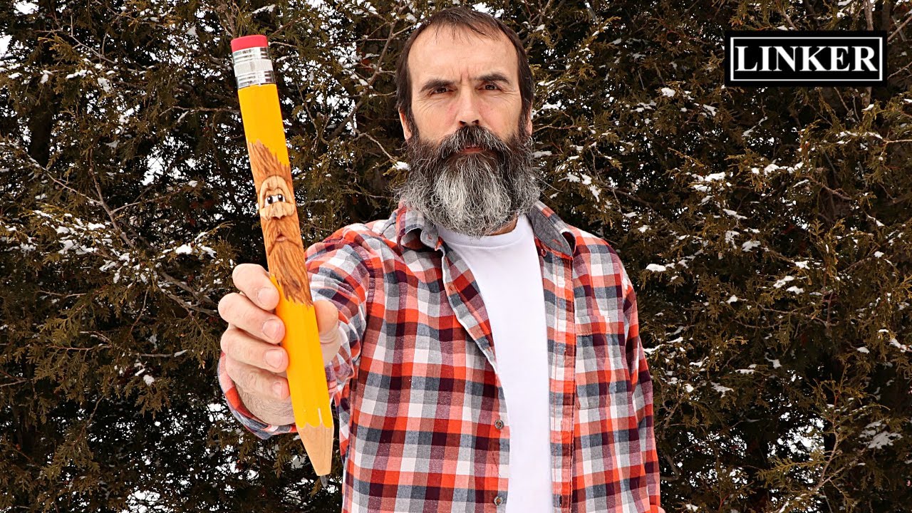 Carving A Wood Spirit On A Giant Pencil