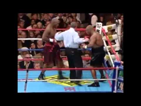 Tyson knocks opponent out cold,  helps him up