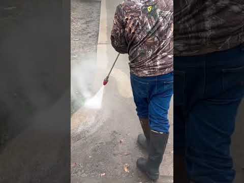Blasting grime off concrete