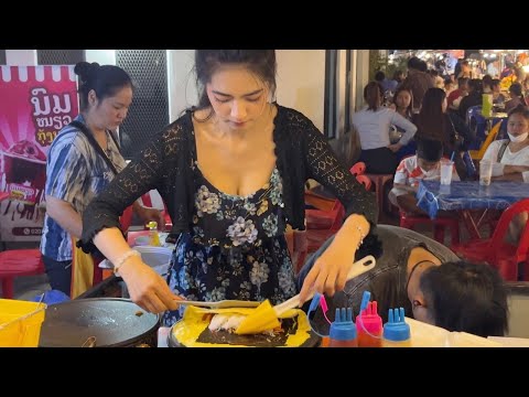 Beautiful Laos omelette lady in Night Market