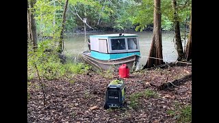 Boat camping overnight adventure and lil G catches his first bass.
