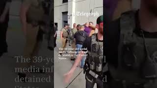 Andrew Tate gives phone away during arrest Andrew Tate gives phone away during arrest