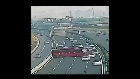 Bus Driver Makes a U-turn on Busy Highway