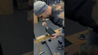 DIY seated calf raise made from a belt squat