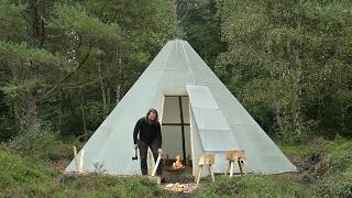 Bushcraft basecamp trip - rain, canvas lavvu, making sawhorse, roasting chicken, sharpening etc