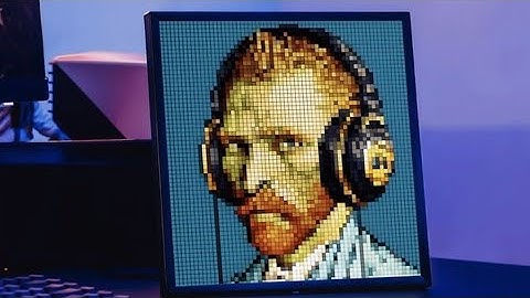 RGB LED matrix panel housed in a frame designed to sit on a desk or hang on a wall. 