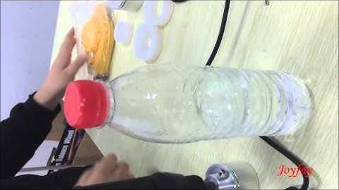 Setting up the Handheld  Bottle Capping Machine