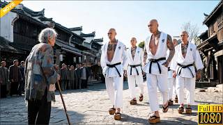 Thugs bully an 80-year-old woman, but she’s a top martial arts master who defeats them on the spot.