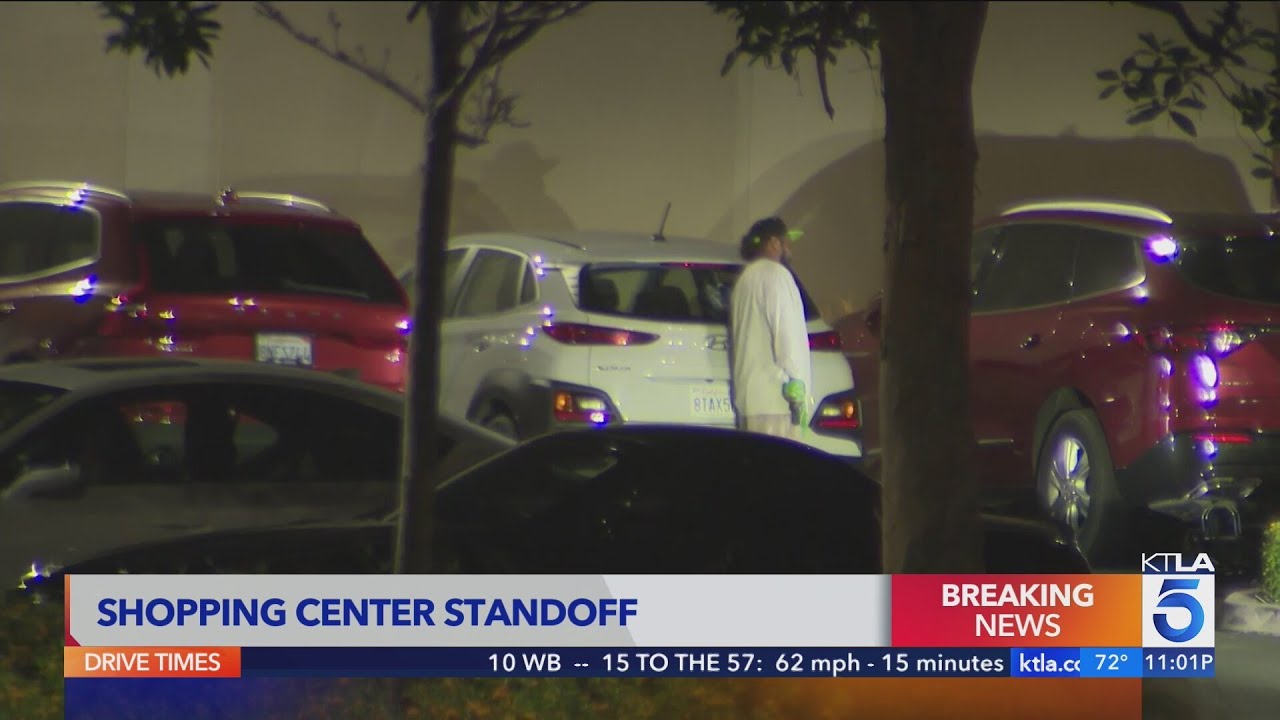 Armed suspect in hours-long standoff with police in Orange County - YouTube