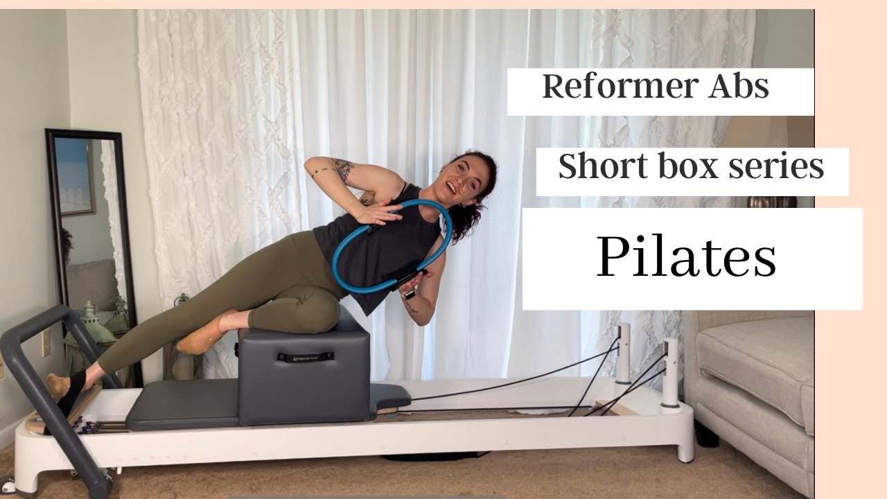 Pilates reformer woman short box side stretch exercise wrkout