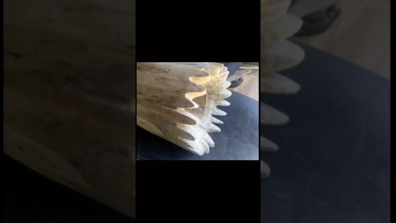 making of a carved log beehive. 