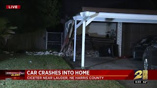 Driver flees after crashing into house