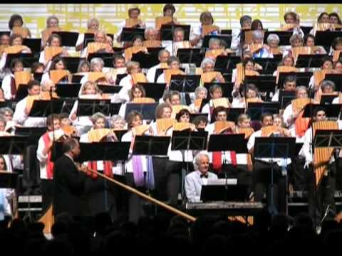 450 Panflutes from the DAJOERI-Panfluteschool play in Zurich Switzerland in the Main Railway Station on September 23rd., 2007. Conductor is Joeri Murk. The Ensemble Pirvu was contributing with their Romanian melodies. Kurt Ott Alphorn.