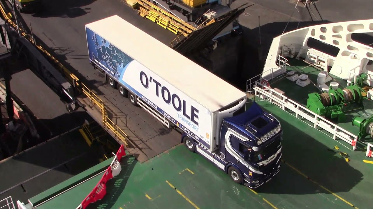 Trucks boarding ship, Dublin, Ireland, May 2021.